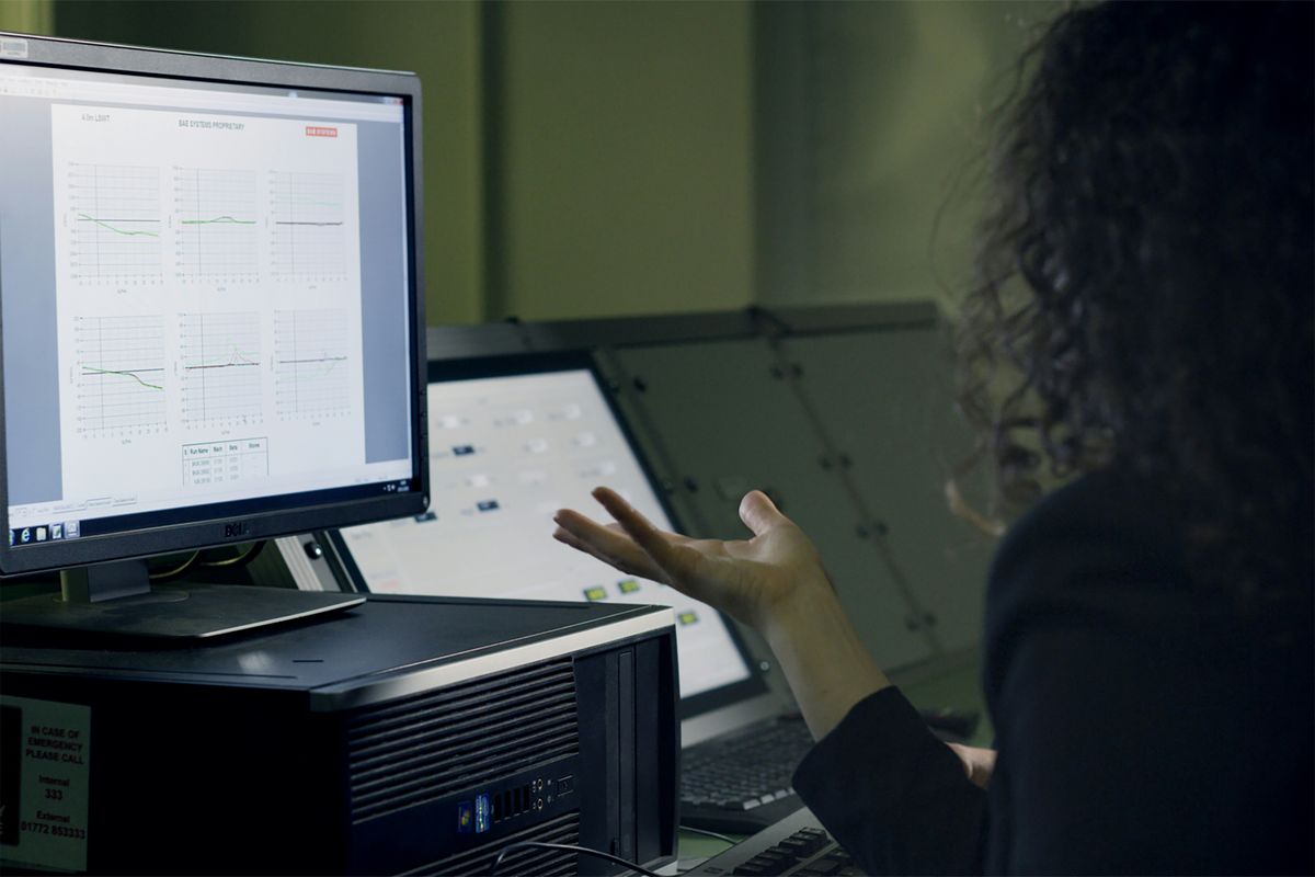 Compliance analyst reviewing verification data